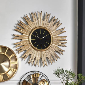 Gold Metal and Black Face Starburst Wall Clock